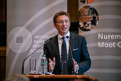 Professor Christoph Safferling speaking on behalf of the Friedrich Alexander University Erlangen-Nuremberg (FAU)